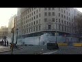 Moment del llançament dels gasos lacrimògens a plaça Catalunya i Passeig de Gràcia.